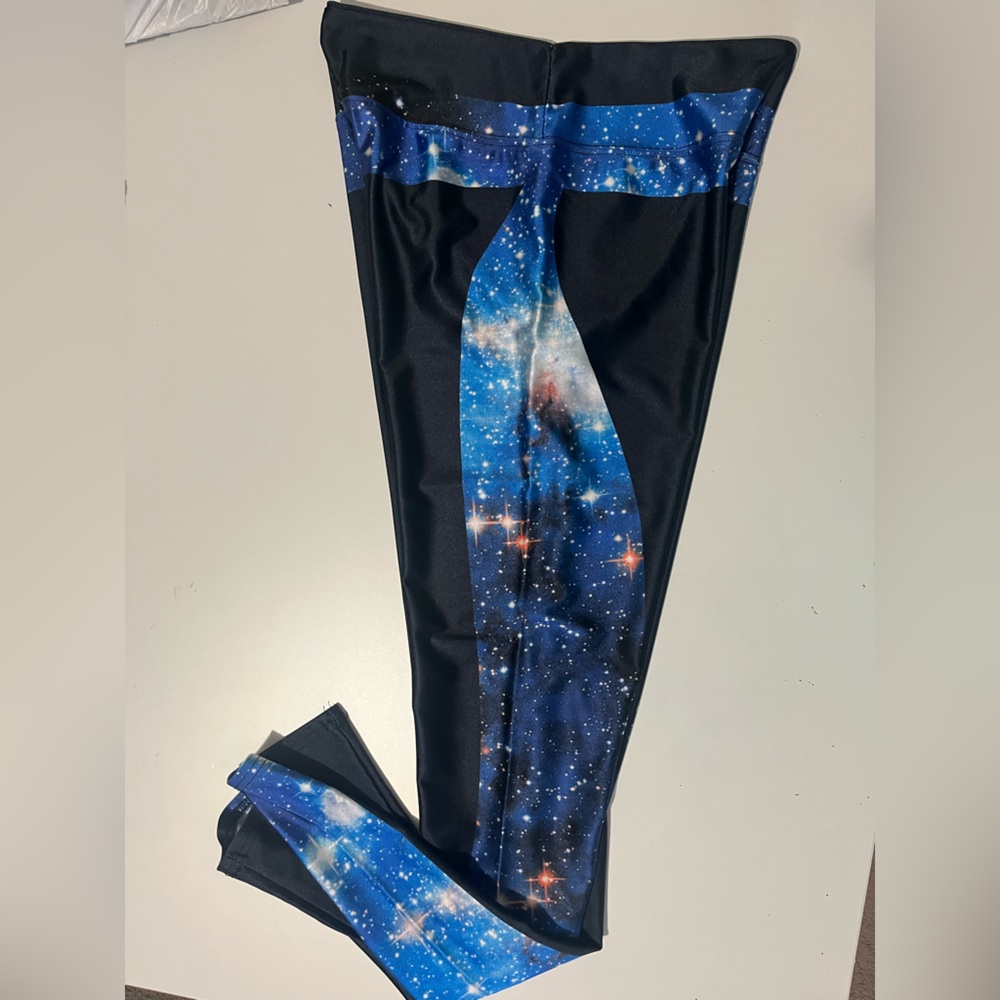 Galaxy print, sheer light weight stretch material. Small.
